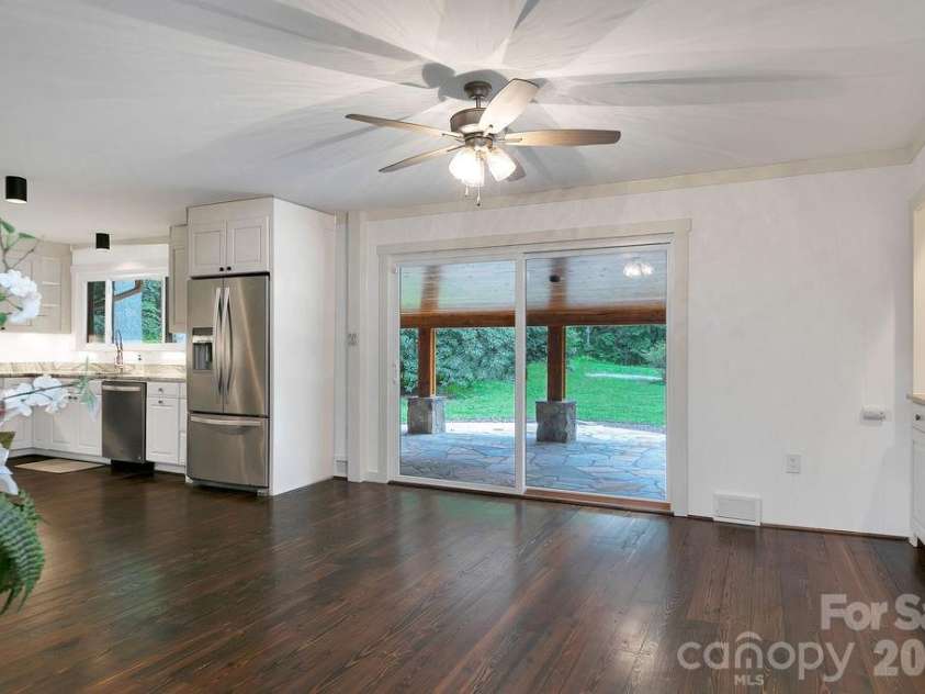 100 Ashton Lane, Brevard, NC 28712.  MLS# CAR4411812, YatesRealty ID 11621. Dining Area to Patio