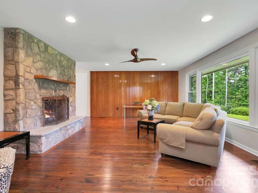 100 Ashton Lane, Brevard, NC 28712.  MLS# CAR4411812, YatesRealty ID 11621. Expansive Living Room