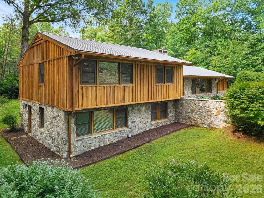 100 Ashton Lane, Brevard, NC 28712.  MLS# CAR4411812, YatesRealty ID 11621. Exquisite Landscaping