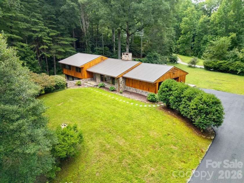 100 Ashton Lane, Brevard, NC 28712.  MLS# CAR4411812, YatesRealty ID 11621. Freshly Paved Driveway