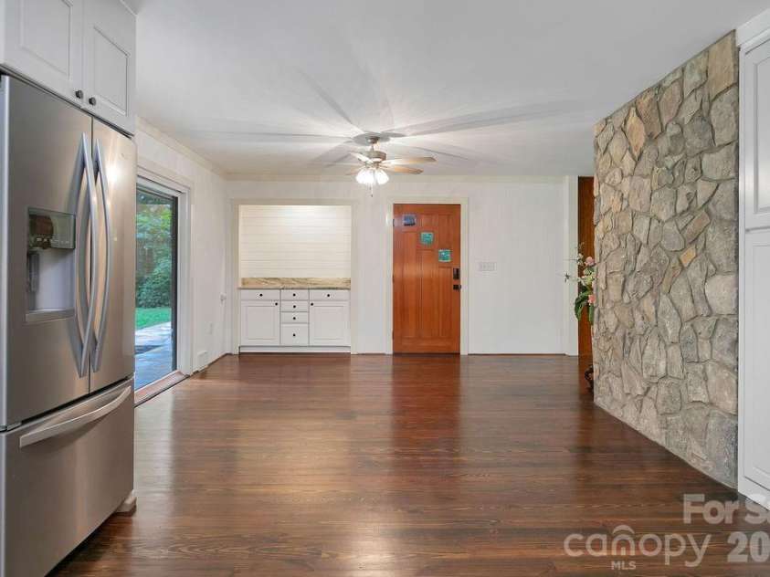 100 Ashton Lane, Brevard, NC 28712.  MLS# CAR4411812, YatesRealty ID 11621. Kitchen to Dining