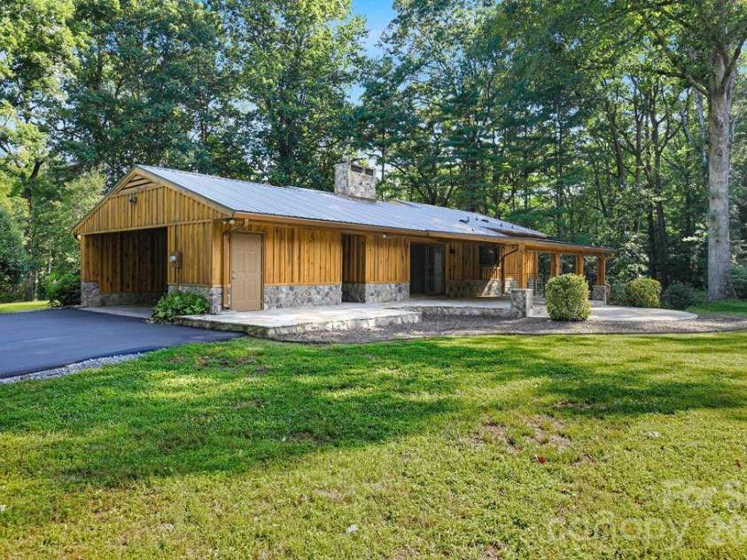 100 Ashton Lane, Brevard, NC 28712.  MLS# CAR4411812, YatesRealty ID 11621. Large, Level Back Yard