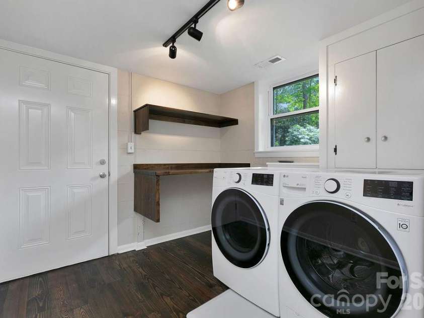 100 Ashton Lane, Brevard, NC 28712.  MLS# CAR4411812, YatesRealty ID 11621. Spacious Laundry Room