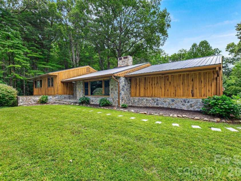 100 Ashton Lane, Brevard, NC 28712.  MLS# CAR4411812, YatesRealty ID 11621. Stone Path to Front Door