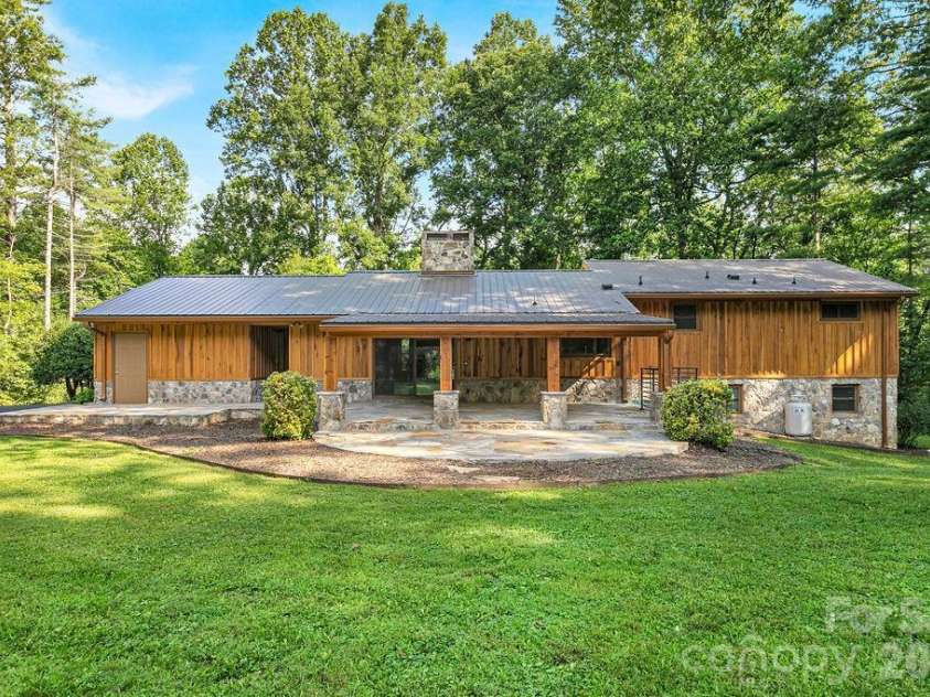 100 Ashton Lane, Brevard, NC 28712.  MLS# CAR4411812, YatesRealty ID 11621. Stunning Home