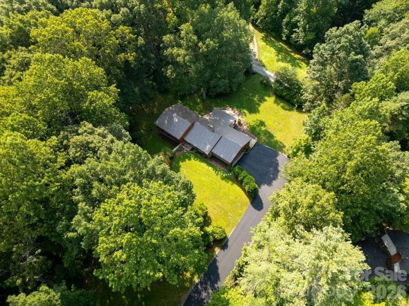 100 Ashton Lane, Brevard, NC 28712.  MLS# CAR4411812, YatesRealty ID 11621. Very Private Lot