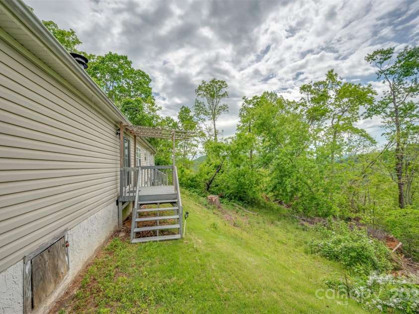 257 River Crest Drive, Flat Rock, NC 28731.  MLS# CAR4253564, YatesRealty ID 11625. 