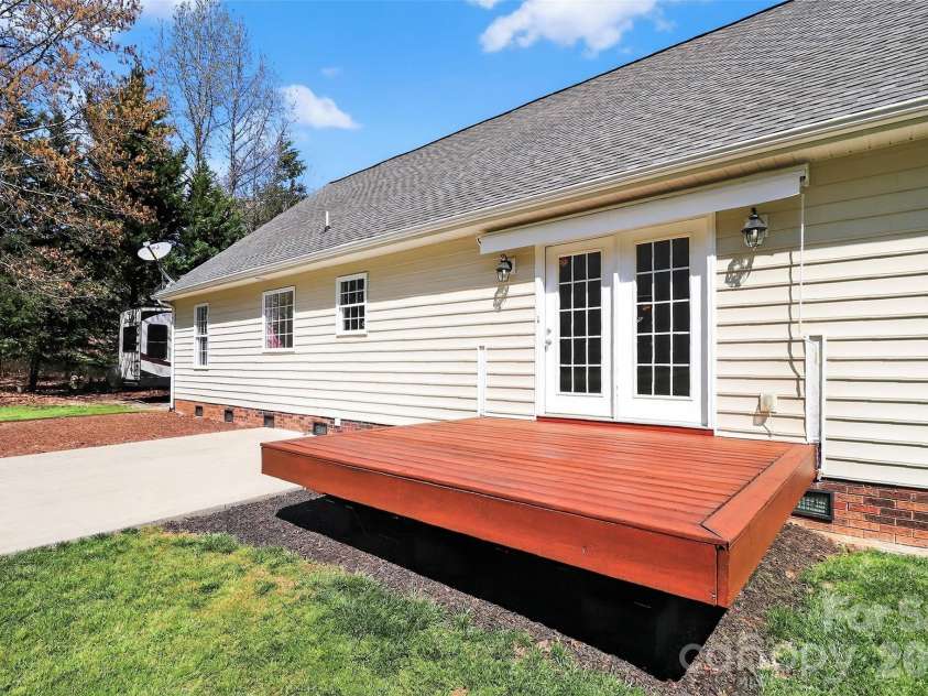 4363 Dusty Ridge Court, Denver, NC 28037.  MLS# CAR4361524, YatesRealty ID 11625. Deck w/ remote controlled awning