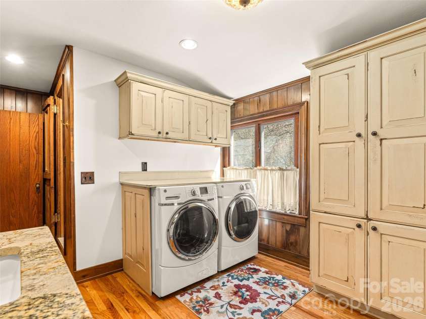 4125 State Highway 197 Highway, Burnsville, NC 28714.  MLS# CAR4361798, YatesRealty ID 11626. Upper level laundry in primary bath