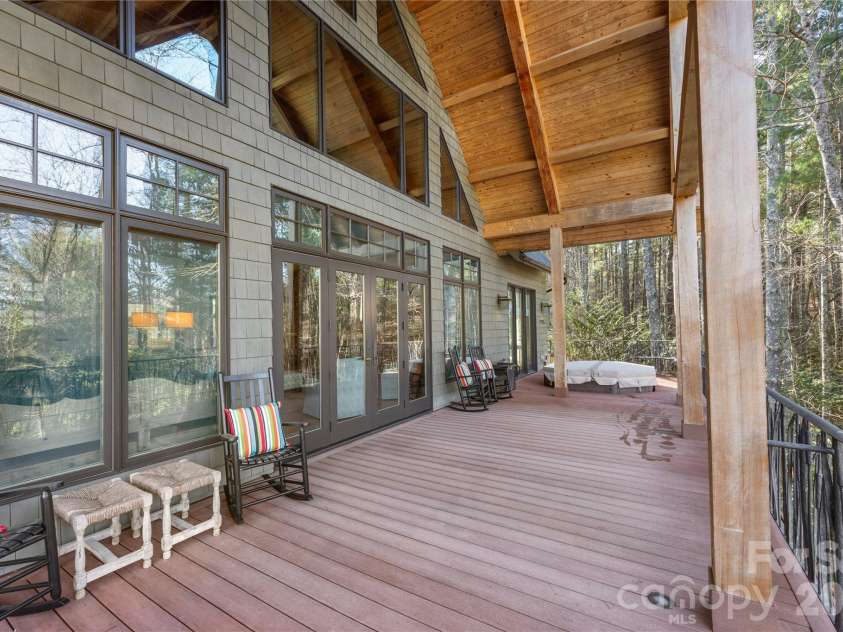 2186 Long Rifle Ridge Road, Nebo, NC 28761.  MLS# CAR4349761, YatesRealty ID 11631. Huge deck space overlooking a peaceful cove