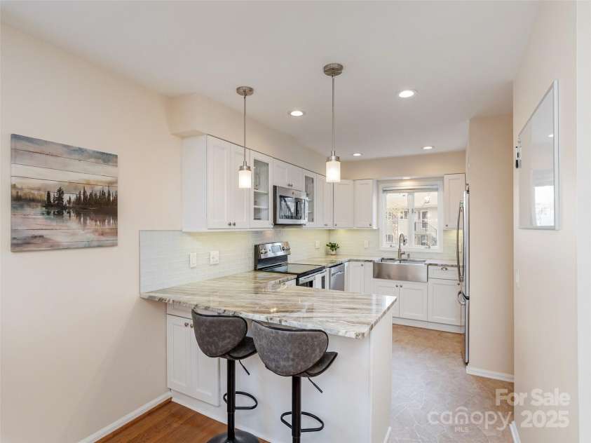 610 Britton Creek Drive, Hendersonville, NC 28791.  MLS# CAR4231552, YatesRealty ID 11631. 