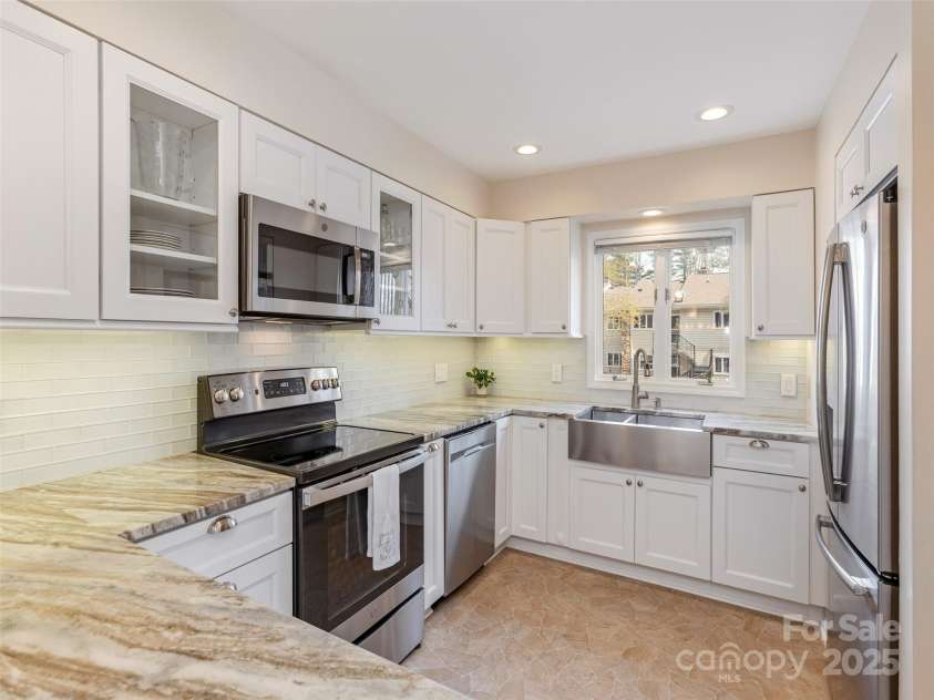 610 Britton Creek Drive, Hendersonville, NC 28791.  MLS# CAR4231552, YatesRealty ID 11631. 