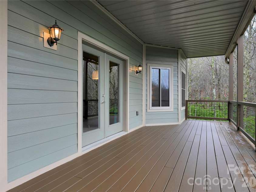 123 Isuhdavga Court, Brevard, NC 28712.  MLS# CAR4354135, YatesRealty ID 11633. Lower Level Deck