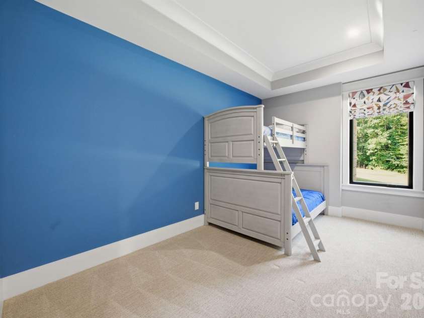 6207 Victory Pass Lane, Waxhaw, NC 28173.  MLS# CAR4398111, YatesRealty ID 11639. Lower Level Bunk Room