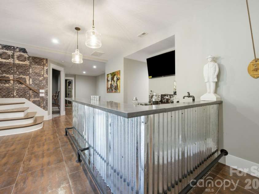 6207 Victory Pass Lane, Waxhaw, NC 28173.  MLS# CAR4398111, YatesRealty ID 11639. Lower Level Entertainment/bar