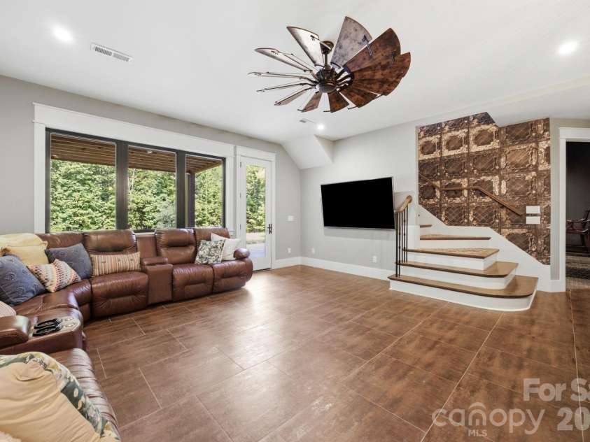 6207 Victory Pass Lane, Waxhaw, NC 28173.  MLS# CAR4398111, YatesRealty ID 11639. Lower Level Great Room
