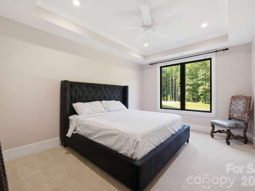 6207 Victory Pass Lane, Waxhaw, NC 28173.  MLS# CAR4398111, YatesRealty ID 11639. Lower Level Secondary Bedroom