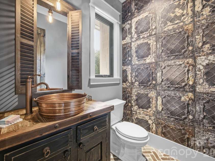 6207 Victory Pass Lane, Waxhaw, NC 28173.  MLS# CAR4398111, YatesRealty ID 11639. Main Level Half Bath