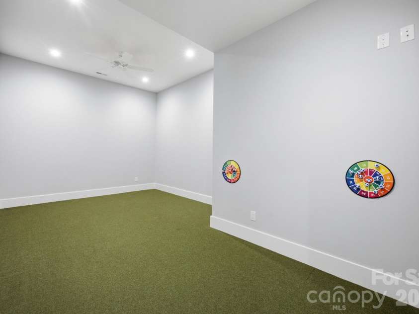 6207 Victory Pass Lane, Waxhaw, NC 28173.  MLS# CAR4398111, YatesRealty ID 11639. Playroom/Golf Simulation Room
