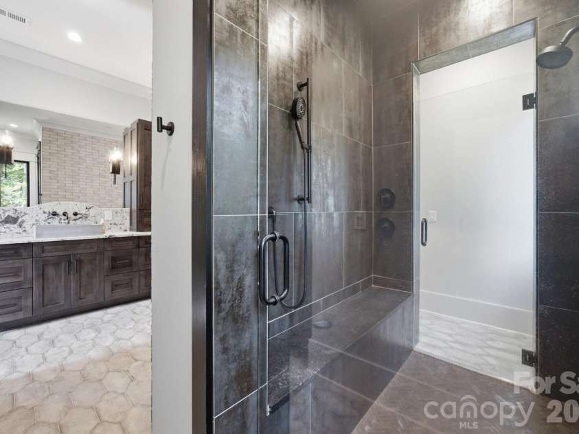 6207 Victory Pass Lane, Waxhaw, NC 28173.  MLS# CAR4398111, YatesRealty ID 11639. Primary Bath walk through shower