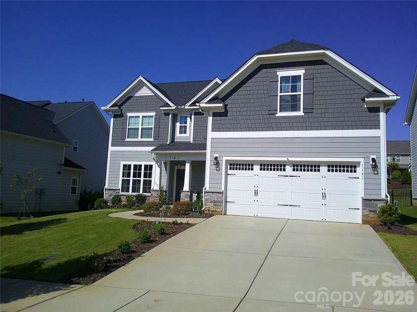 1141 Overlake Drive, Belmont, NC 28012.  MLS# CAR4336067, YatesRealty ID 11647. Front Yard Summer **