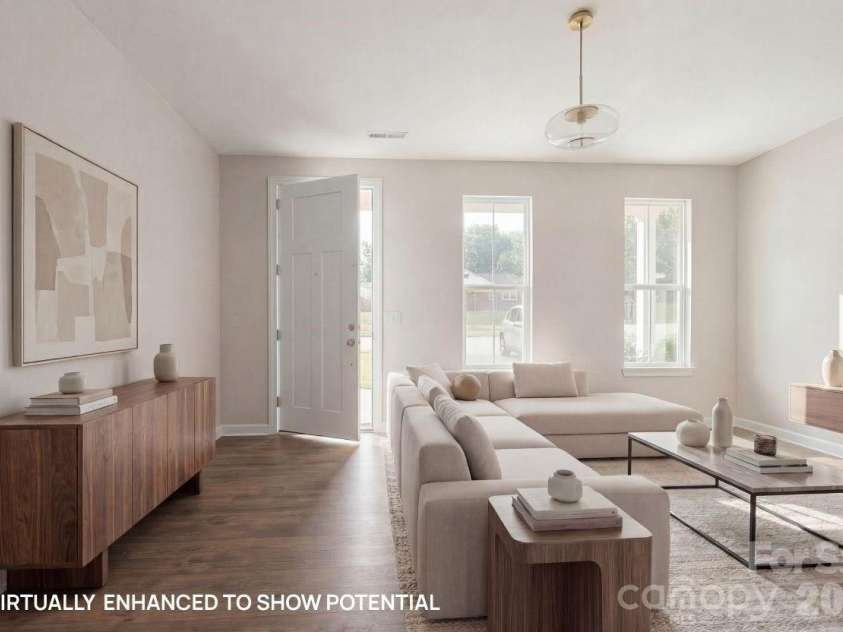 2817 Shamrock Drive, Charlotte, NC 28205.  MLS# CAR4355580, YatesRealty ID 11649. Comfortable and functional living space with durable LVP flooring and versatile layout for relaxing or hosting guests