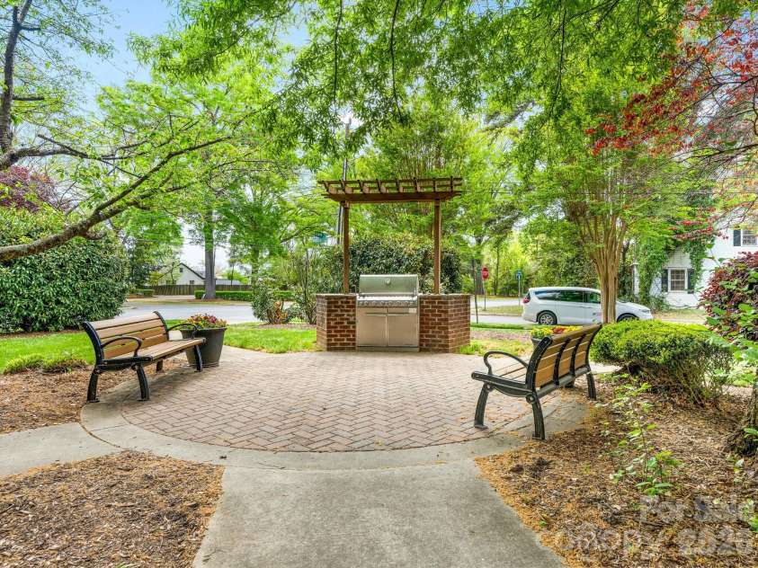 2964 Selwyn Avenue, Charlotte, NC 28209.  MLS# CAR4366905, YatesRealty ID 11654. Community Grill and Seating Area