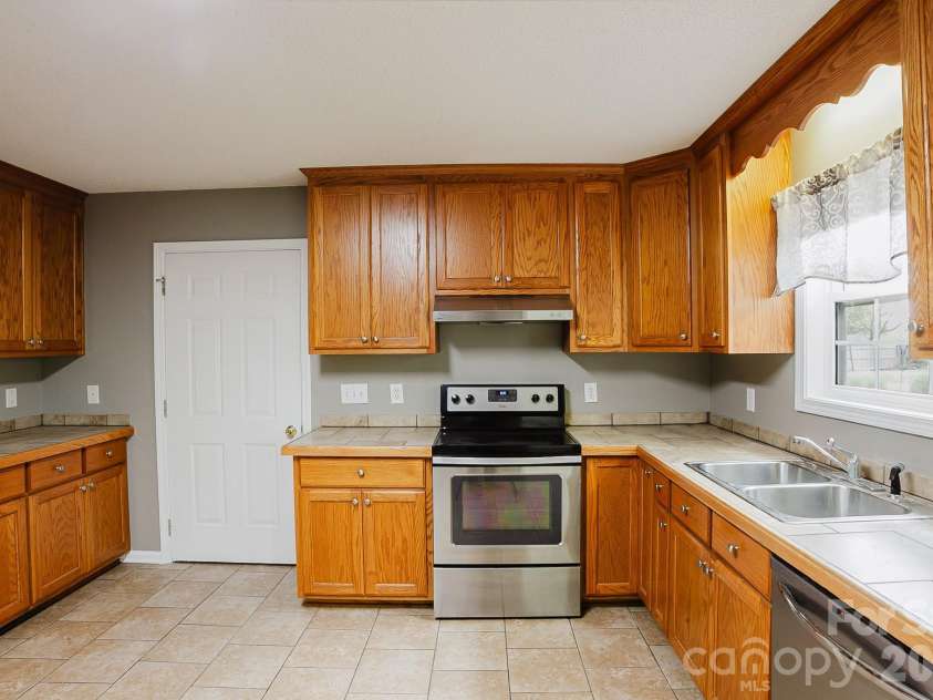 2104 Badin Road, Albemarle, NC 28001.  MLS# CAR4365259, YatesRealty ID 11657. 