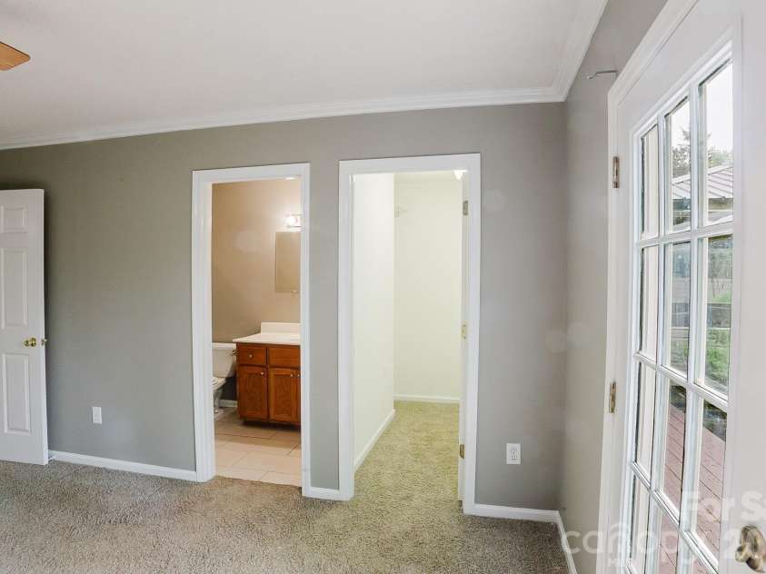 2104 Badin Road, Albemarle, NC 28001.  MLS# CAR4365259, YatesRealty ID 11657. Primary bedroom 