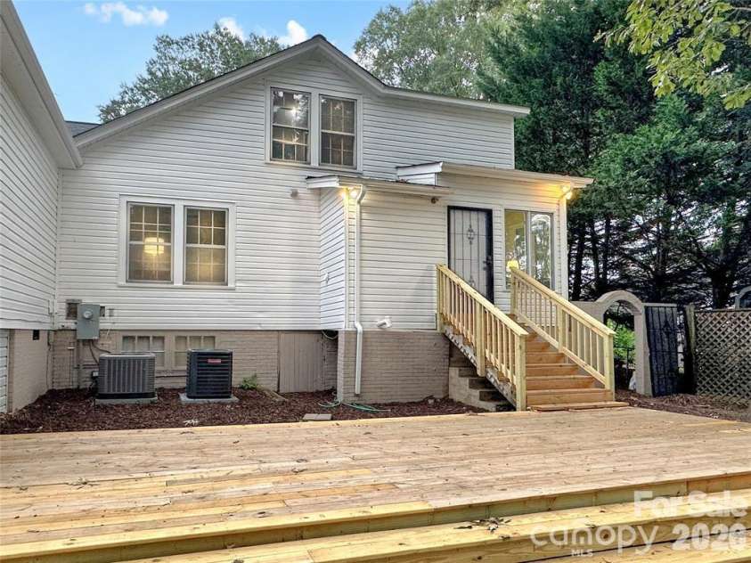 317 8th Street, Hickory, NC 28601.  MLS# CAR4361363, YatesRealty ID 11658. Patio - stairs lead to Kitchen & Breakfast Area