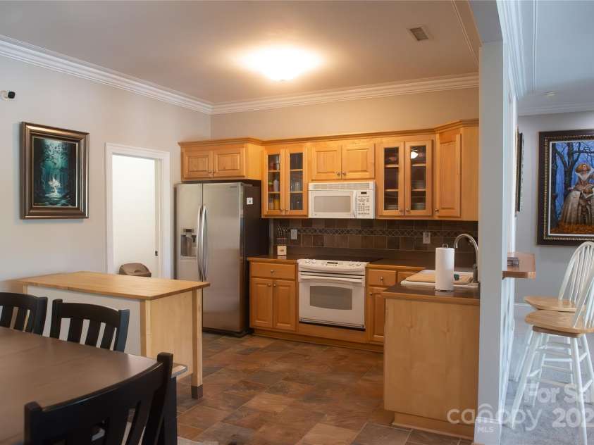 447 Shagbark Court, Mount Gilead, NC 27306.  MLS# CAR4244674, YatesRealty ID 11658. Full kitchen in basement