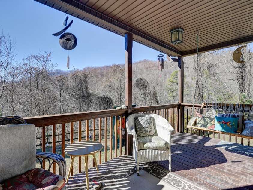 2 Ruffed Grouse Drive, Weaverville, NC 28787.  MLS# CAR4330226, YatesRealty ID 11659. Quiet long range views from the front porch