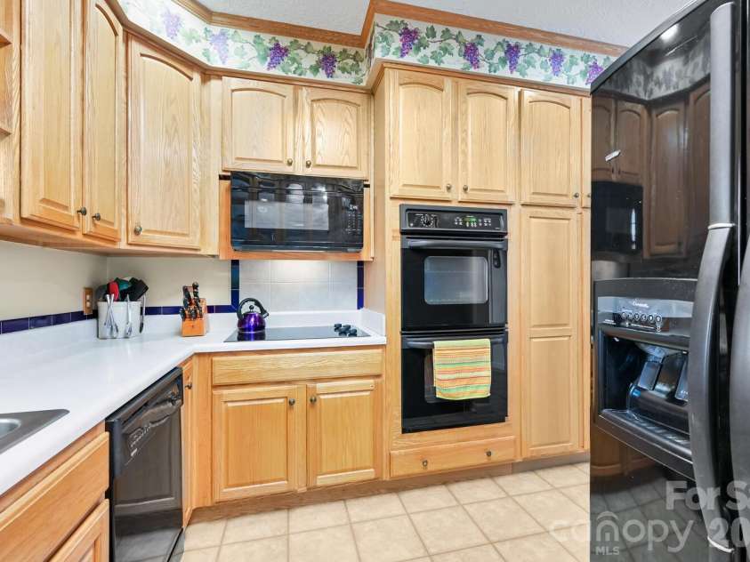 2 Ruffed Grouse Drive, Weaverville, NC 28787.  MLS# CAR4330226, YatesRealty ID 11659. Spacious kitchen