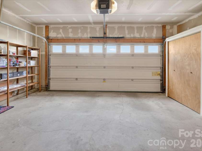 4492 Antelope Lane, Charlotte, NC 28269.  MLS# CAR4358103, YatesRealty ID 11660. OVERSIZED TWO CAR GARAGE WITH EXTRA CLOSET STORAGE!