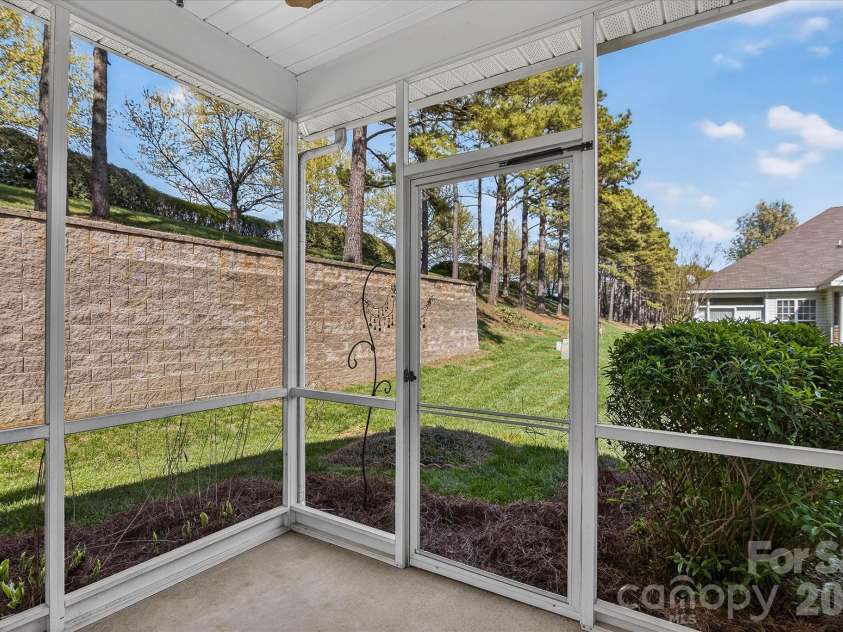 4492 Antelope Lane, Charlotte, NC 28269.  MLS# CAR4358103, YatesRealty ID 11660. VIEWS FROM YOUR SCREENED IN SIDE PATIO!