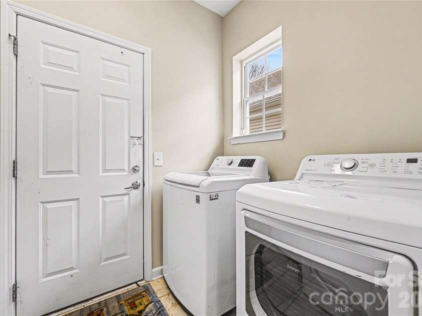 57106 Nightingale Way, Indian Land, SC 29707.  MLS# CAR4349782, YatesRealty ID 11662. Almost new washer and dryer convey.  Not shown:  sink and cabinets on opposite wall.