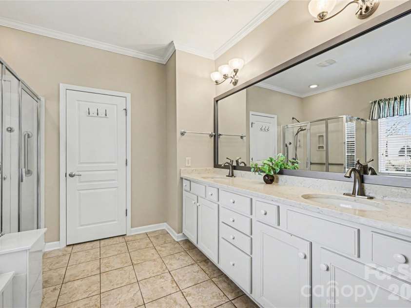 57106 Nightingale Way, Indian Land, SC 29707.  MLS# CAR4349782, YatesRealty ID 11662. Ensuite primary bathroom features double sinks.