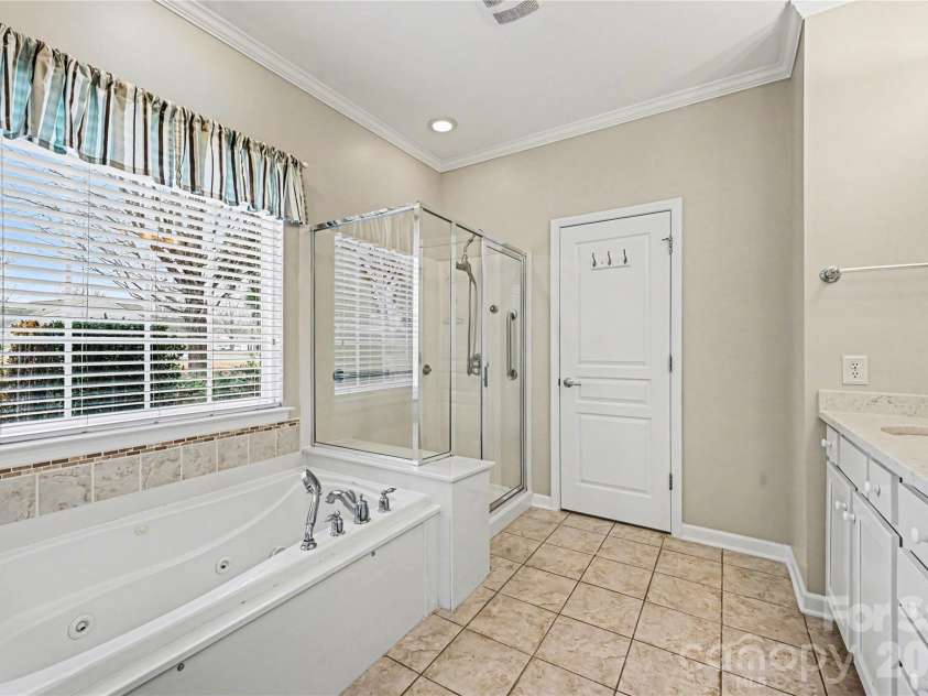 57106 Nightingale Way, Indian Land, SC 29707.  MLS# CAR4349782, YatesRealty ID 11662. Primary bath has a jetted tub and separate shower.
