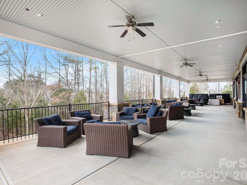 57106 Nightingale Way, Indian Land, SC 29707.  MLS# CAR4349782, YatesRealty ID 11662. Rear patio at The Lodge.