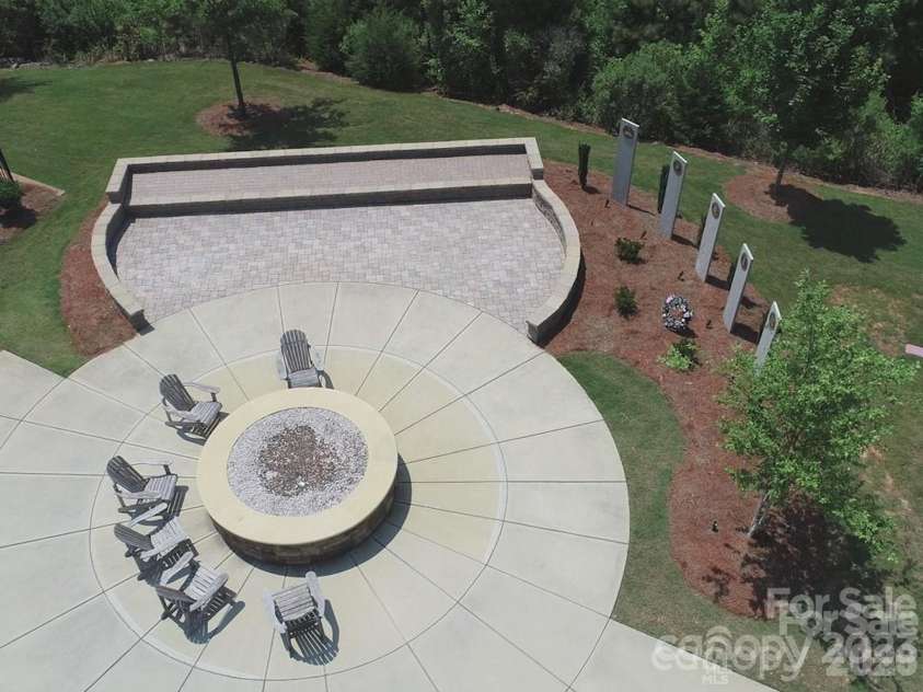 57106 Nightingale Way, Indian Land, SC 29707.  MLS# CAR4349782, YatesRealty ID 11662. Sun City Carolina Lakes honors its Veterans with a memorial garden and a comfortable place to relax.