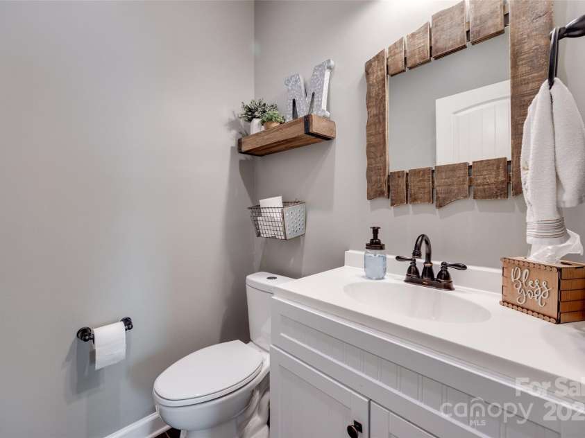 1446 Cilantro Court, Tega Cay, SC 29708.  MLS# CAR4248614, YatesRealty ID 11666. Half bath