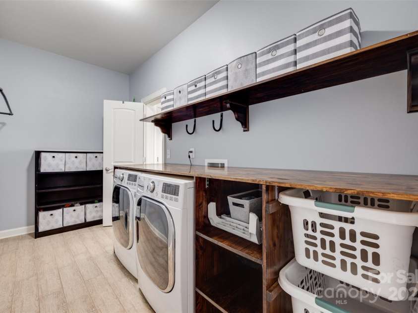 1446 Cilantro Court, Tega Cay, SC 29708.  MLS# CAR4248614, YatesRealty ID 11666. Laundry room
