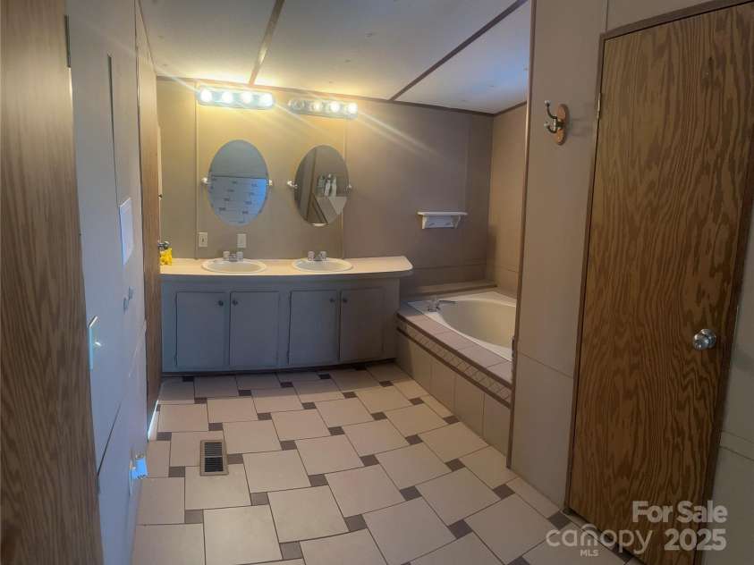 8183 Hallman Mill Road, Vale, NC 28168.  MLS# CAR4234132, YatesRealty ID 11667. Master bathroom