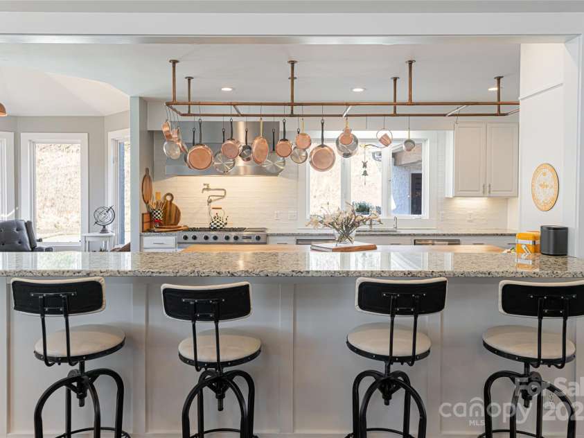 300 Springhill Drive, Rutherfordton, NC 28139.  MLS# CAR4152594, YatesRealty ID 1167. Bar area into kitchen