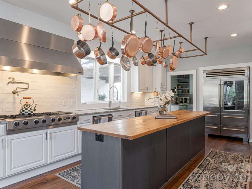 300 Springhill Drive, Rutherfordton, NC 28139.  MLS# CAR4152594, YatesRealty ID 1167. Kitchen & entry to pantry