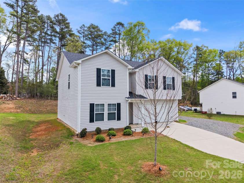 319 Shoreline Drive, New London, NC 28127.  MLS# CAR4366530, YatesRealty ID 11670. 