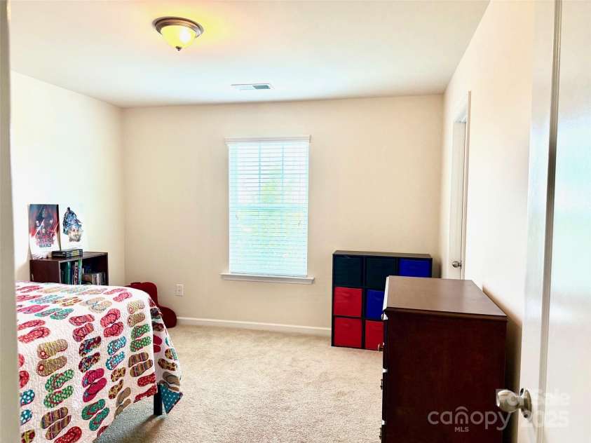 121 Mackinac Drive, Mooresville, NC 28117.  MLS# CAR4218931, YatesRealty ID 11674. Perfect kids room w. walk-in closet.