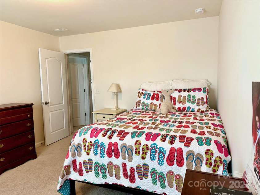 121 Mackinac Drive, Mooresville, NC 28117.  MLS# CAR4218931, YatesRealty ID 11674. There are three kids/guest rooms upstairs in addition to the main bedroom.
