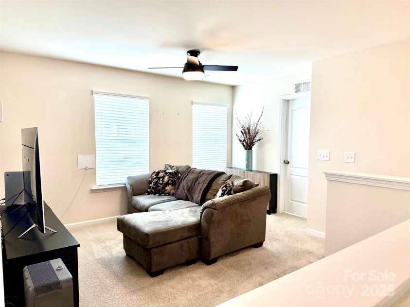 121 Mackinac Drive, Mooresville, NC 28117.  MLS# CAR4218931, YatesRealty ID 11674. Upstairs Family Room