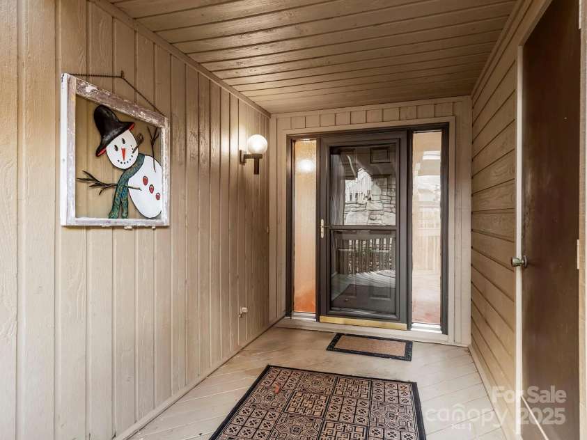 401 Scarlet Oak Lane, Hendersonville, NC 28791.  MLS# CAR4215612, YatesRealty ID 11677. Covered Entry & Storage Closet